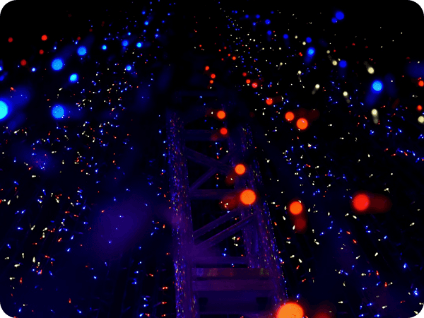 Abstract pattern of colorful lights on a dark background